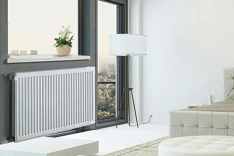 空气能热泵，末端选暖气片还是地暖？